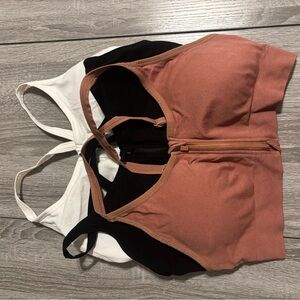 Set of Three Sports Bras in Black, White, and Pink